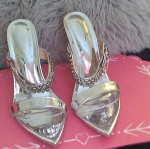 Never worn ladies Metallic silver open toe stiletto heels